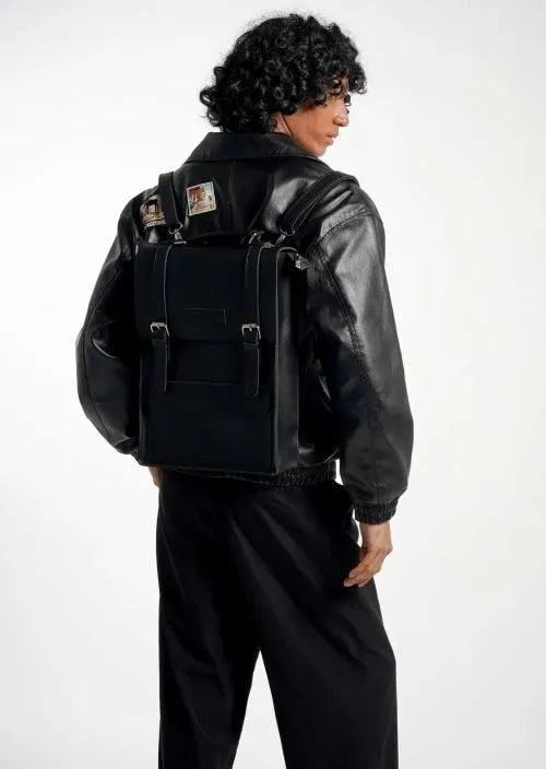 A man with a black backpack
