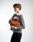 Geneva Elongated Top Handle Bag Tan