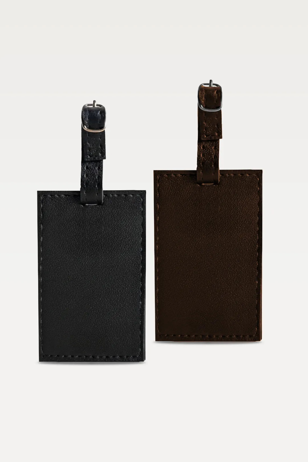Two black leather luggage tags on a white background
#global