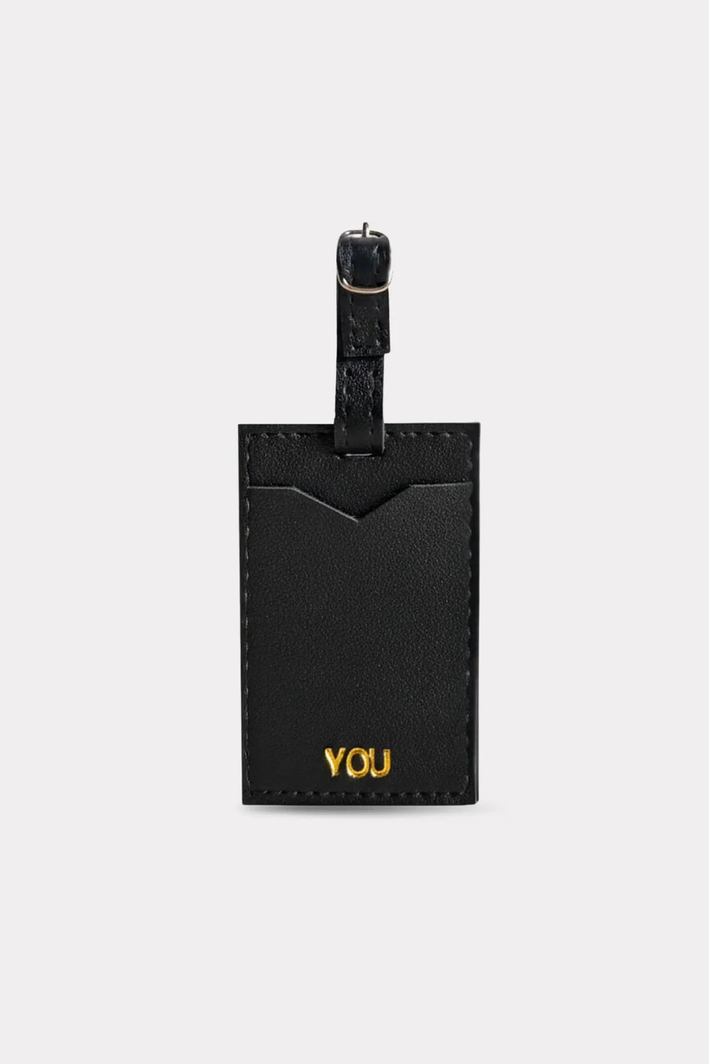 Black luggage tag with 'YOU' engraved on a white background