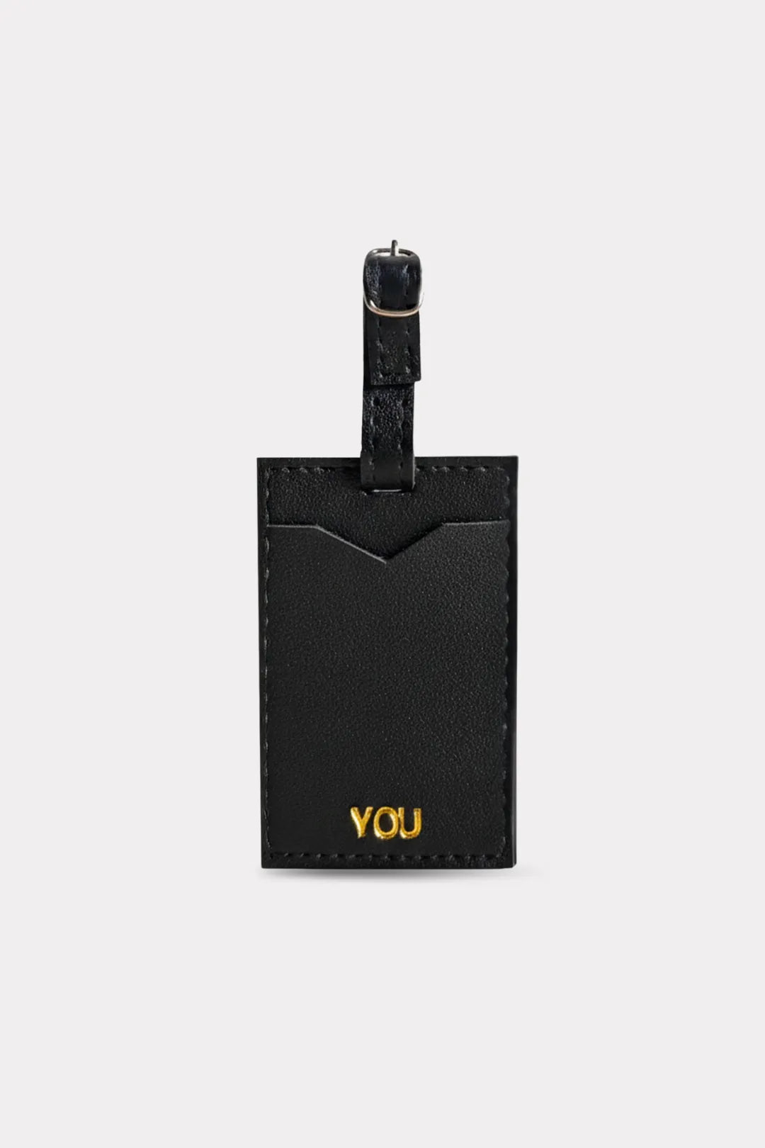 Black luggage tag with 'YOU' engraved on a white background