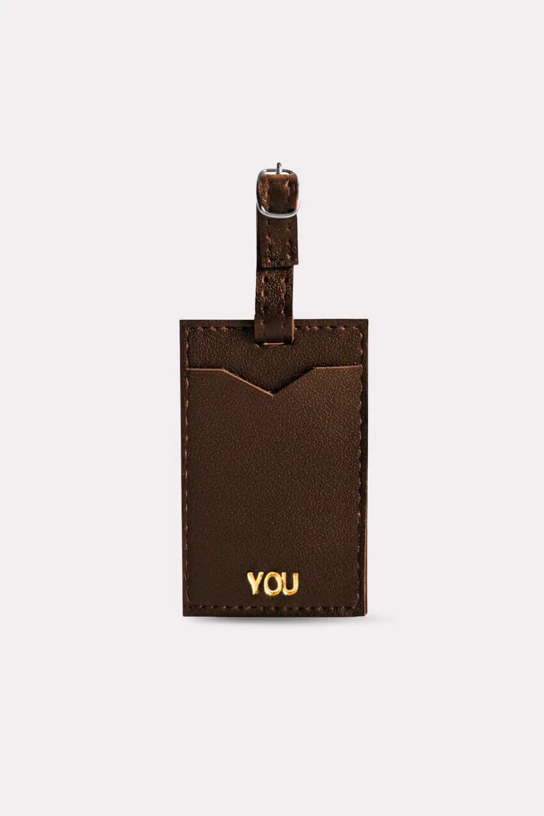 Brown leather luggage tag with 'YOU' engraved on a white background
