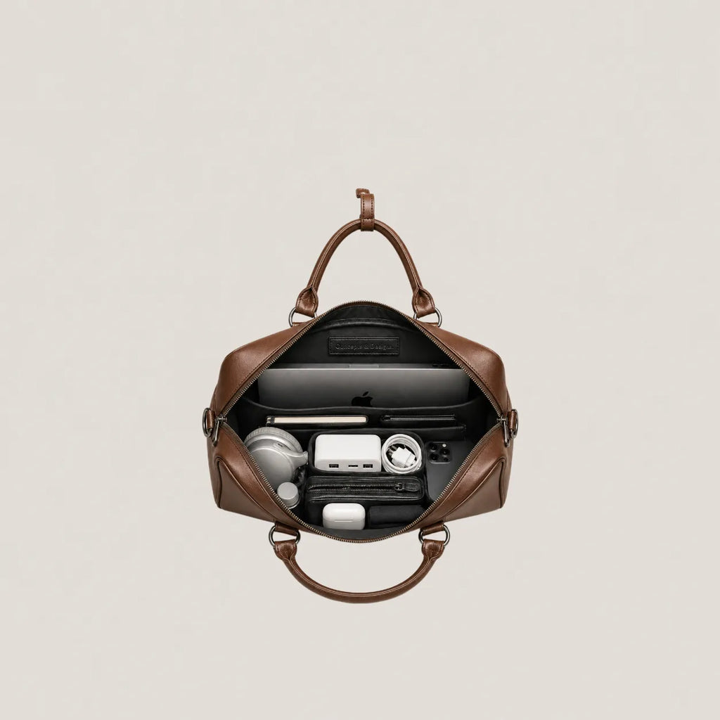 Laptop bag showing its content
#color_brown