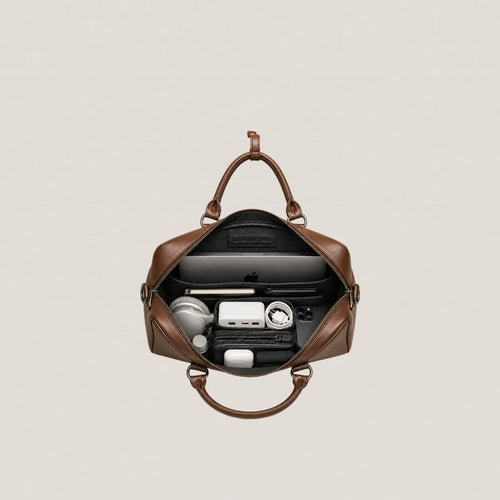 Laptop bag showing its content
#color_brown