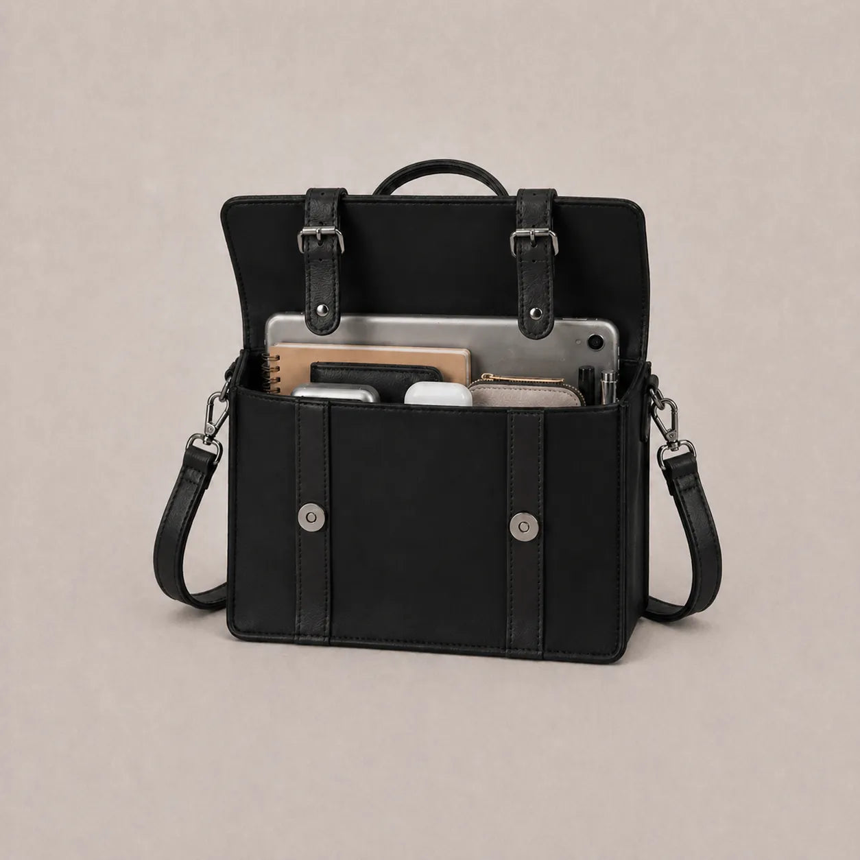 Black laptop bag with content
#color_midnight