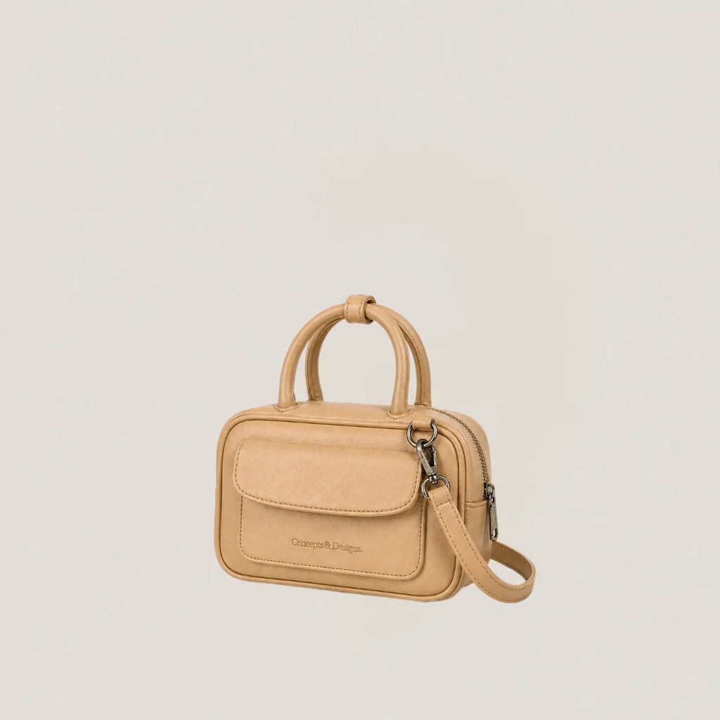 Beige elongated mini bag side view
#color_light beige