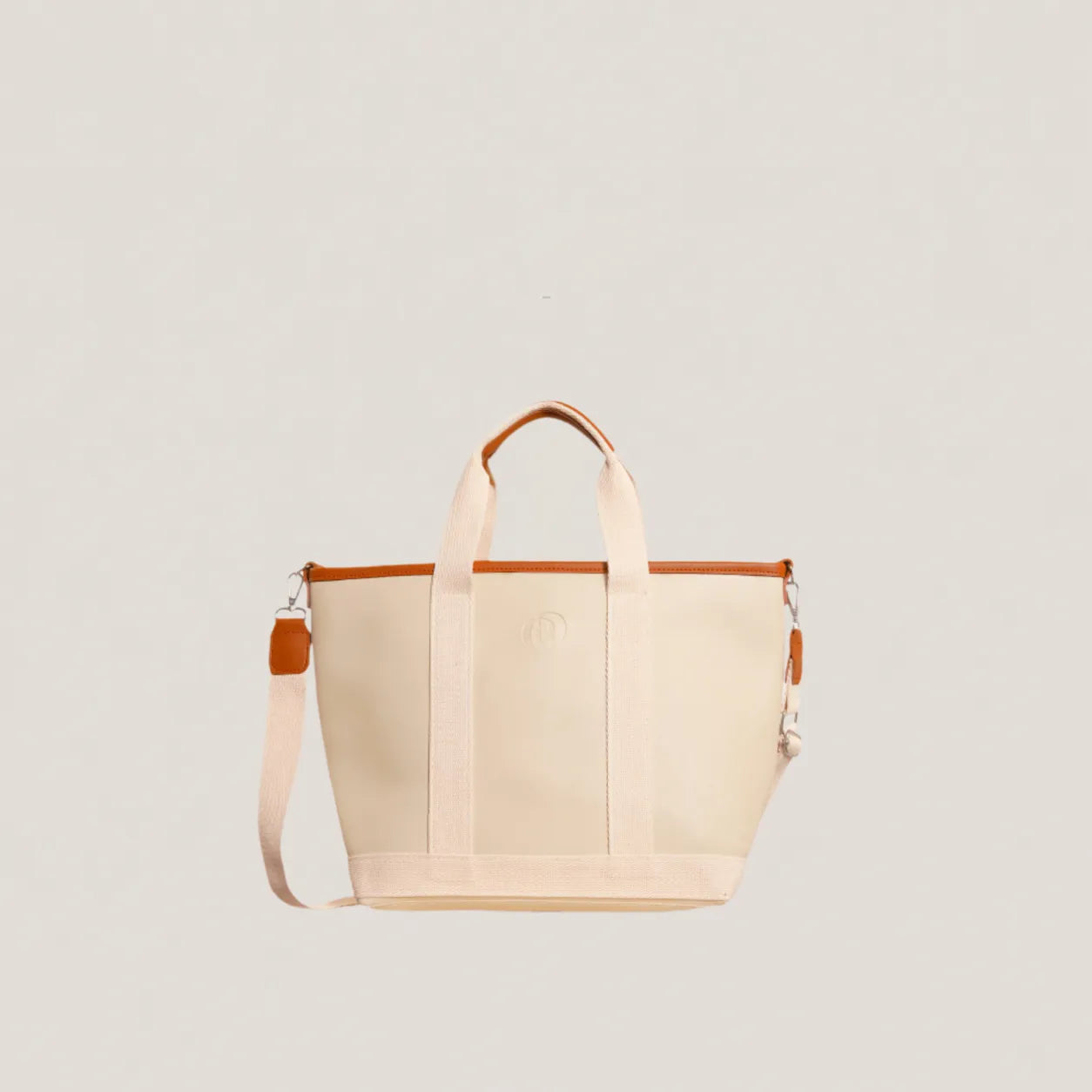 Beige tote bag with brown accents on a light gray background
#color_oat