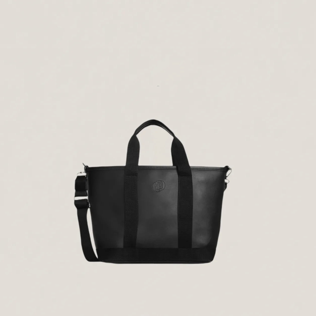 Black handbag with a shoulder strap on a light gray background
#color_shadow