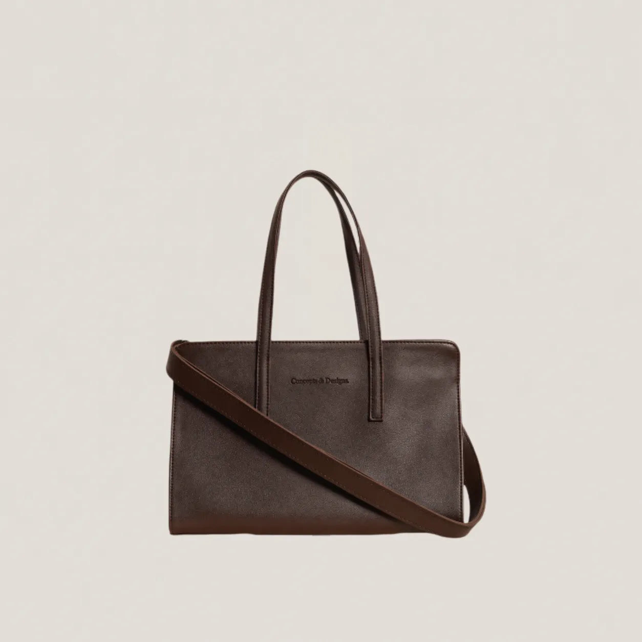 Brown handbag with a shoulder strap on a beige background
#color_brown