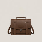 Brown leather satchel bag on a light beige background
#color_dark brown