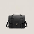 Black leather satchel bag on a light gray background
#color_midnight