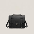 Black leather satchel bag on a light gray background
#color_midnight