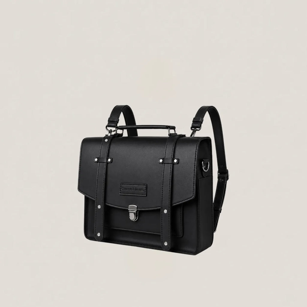 Black leather satchel bag on a beige background
#color_midnight