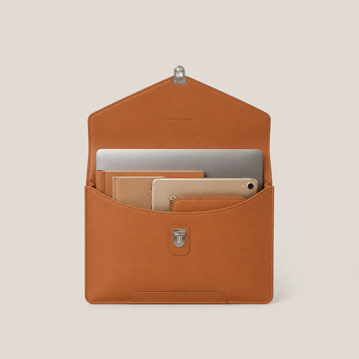 Brown leather sleeve with compartments for electronic devices on a beige background
#color_chestnut