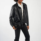 Person wearing a black leather jacket with a white shirt underneath on a white background
#color_midnight