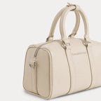 Close up of a beige mini bag
#color_light beige